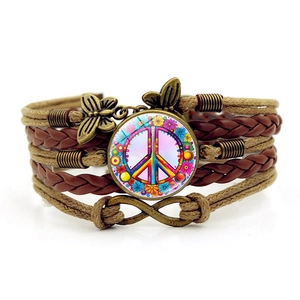 Pink floral peace sign bracelet with vintage multilayer braided leather and charms