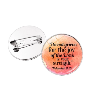 Set of two inspirational bible verse brooches featuring round glass gems and silver pins