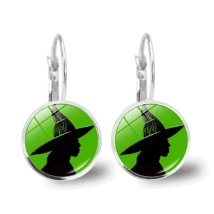 Classic silver witch silhouette earrings with vibrant green background for Halloween