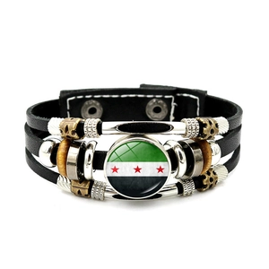 Detail of Syrian flag leather bracelet with braided cord and vintage beads