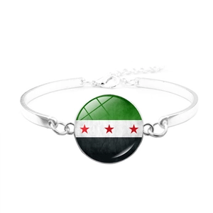 Adjustable silver bangle bracelet featuring the Syrian flag glass cabochon charm