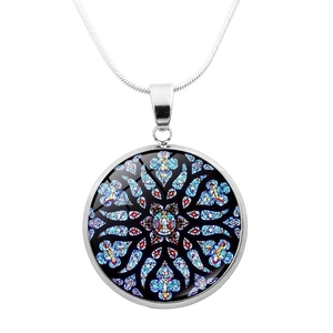 Detailed close-up of a vintage stained glass rose window pendant on a silver snake chain