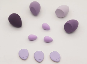 Detailed set of 10 purple makeup sponges and finger puffs in waterdrop and teardrop shapes