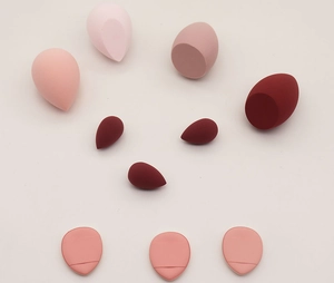 Detail view of 10pcs makeup sponge set featuring teardrop and finger cushion shapes