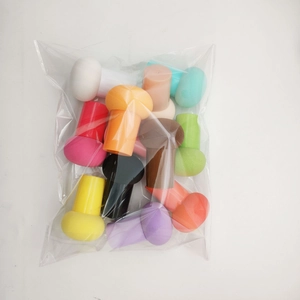 Multi-colored mushroom-head makeup sponges in bulk packaging for professional use