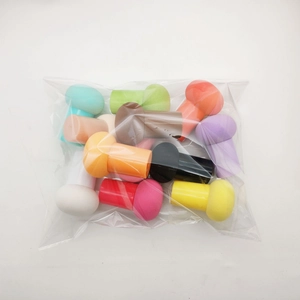 Assorted colorful mushroom head makeup sponges in transparent bulk packaging