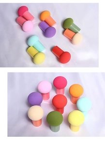 Macro shot of colorful mushroom head makeup sponges on a soft textured fabric
