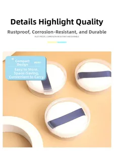 Three-piece round powder puff set with dark blue ribbons and clear storage cases