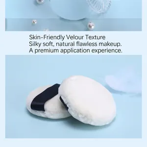 Two-piece set of round plush makeup puffs with dark blue satin ribbons for loose powder