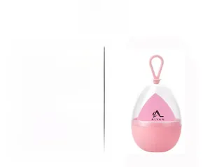 Close-up of pink teardrop makeup sponge in eggshell case with detailed specifications
