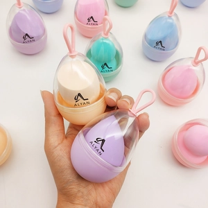 Colorful makeup sponge blender set in portable egg-shaped cases with lanyard straps