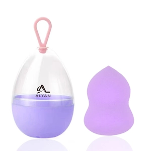 Purple gourd-shaped makeup sponge in a portable eggshell case with silicone lanyard