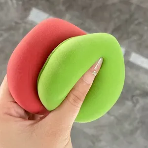 Waterdrop and peach shaped makeup sponges in vibrant red and green colors