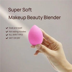 Macro shot of ultra soft rose pink makeup sponge showing water expansion feature