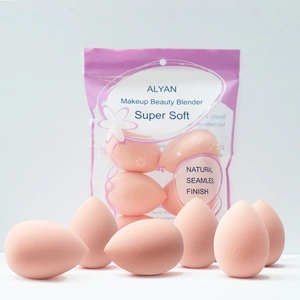 Macro detail of super soft pink teardrop makeup sponges with seamless finish texture