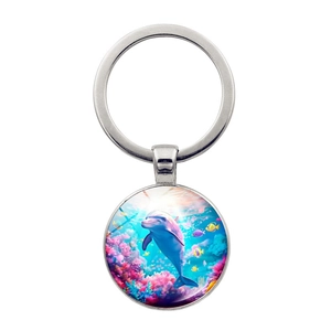 Silver metal keychain featuring a colorful ocean world with dolphin and coral reefs