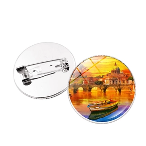Detail showing the front Venice oil painting design and the back silver metal pin closure
