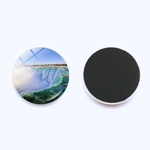 Round magnetic fridge magnet featuring Niagara Falls landscape with crystal glass finish