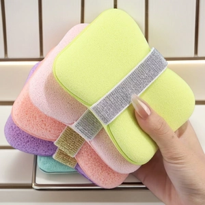 Detailed texture of colorful exfoliating sponges with glittery elastic hand straps