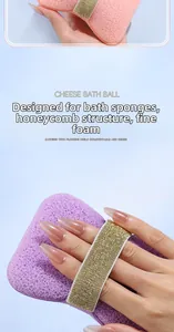 Detail of pink and purple honeycomb cheese bath balls with elastic gold sequin straps