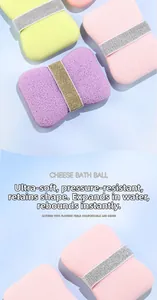 Detail of bow-shaped bath sponge showing ultra-soft texture and fast-rebound material