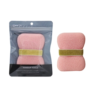 Pink butterfly-shaped soft makeup sponge with golden elastic band and retail packaging