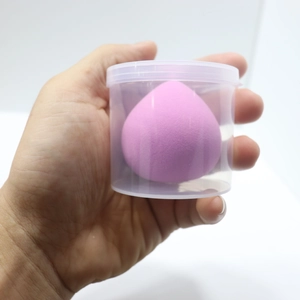 Soft purple teardrop makeup sponge blender with transparent storage canister box