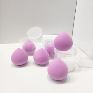 Set of 5 purple teardrop makeup sponges in individual transparent storage boxes