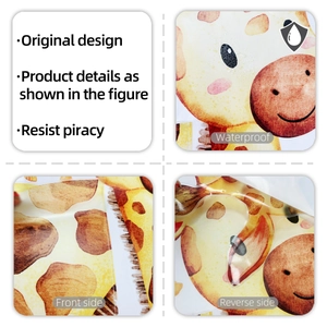 Close-up of waterproof cartoon giraffe wall sticker showing PVC texture and adhesive back