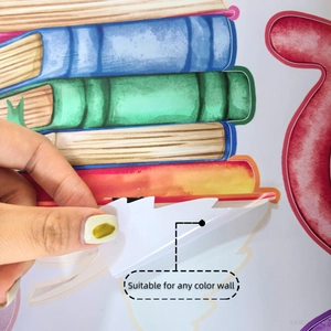 Detail showing self-adhesive colorful book stack wall decal being peeled for any wall