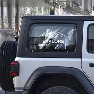 White Explore mountain and arrow vinyl car sticker decal on a silver SUV window