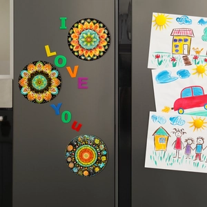 Three-piece set of colorful round mandala pattern magnetic fridge stickers on a metal surface