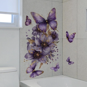 Detail of purple hand-painted flowers and butterflies with gold glitter on bathroom wall