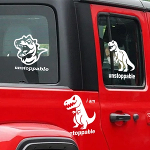 White unstoppable dinosaur car stickers set on a red vehicle window and body