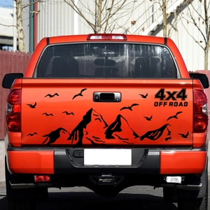 Black mountain and birds 4x4 off-road vinyl decal sticker on orange truck tailgate