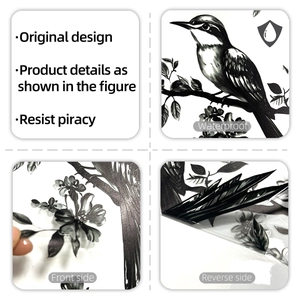 Detailed views of waterproof bird and branch window stickers with adhesive backing