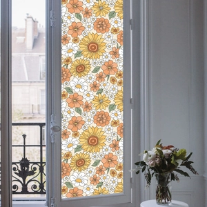 Detail of floral window film with sunflowers and daisies on French glass panels
