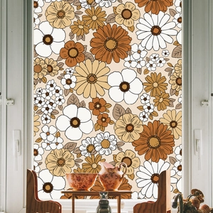 Detail of vintage 70s floral frosted window film with sunflower and daisy patterns