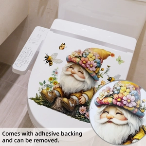 Detail of waterproof cartoon gnome wall sticker applied on a white toilet lid surface
