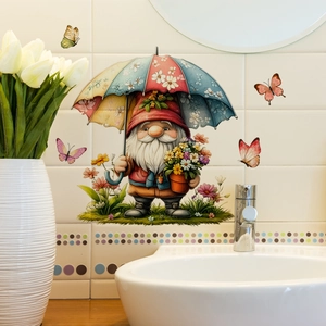Detail of garden gnome wall sticker with floral umbrella on white bathroom tiles