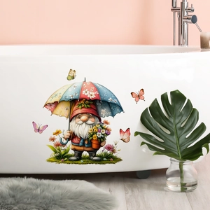 Garden gnome sticker with rainbow umbrella and butterflies on a white bathtub
