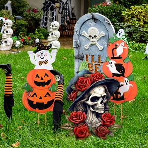 Halloween garden stakes with pumpkins, skulls, and witch legs for outdoor yard decoration