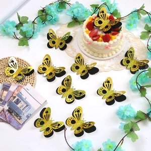 3D hollow gold glitter butterfly cake toppers on a strawberry cake in a party scene