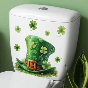 St. Patrick's Day green hat and shamrock wall stickers on a white toilet tank