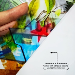 Detail showing self-adhesive backing and removable feature of colorful wall stickers