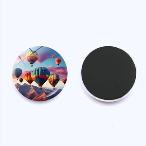 Detailed front and back view of a 25mm round glass fridge magnet with hot air balloon art