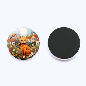 Detailed view of round fridge magnet with cat illustration and black magnetic backing