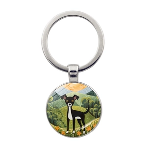 Detailed view of dog keychain with artistic greyhound illustration and metal ring