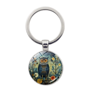 Artistic owl time gem keychain with silver metal ring and colorful forest illustration