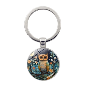 Artistic owl owl glass cabochon keychain with a round silver alloy pendant and star sky pattern